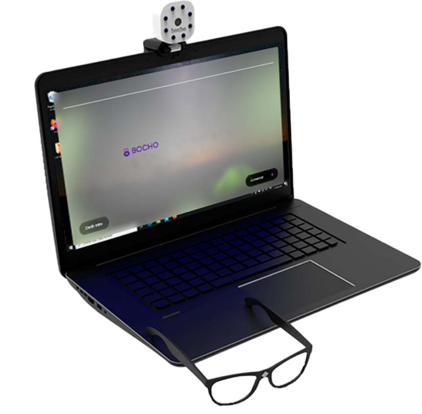 Laptop with a reflective sticker and glasses on the keyboard, with the screen displaying the Bocho interface.